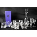 A quantity of cut and moulded glassware to include decanters, bowls,