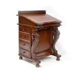 A Victorian-style mahogany Davenport, the top with hinged lid,