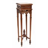 A reproduction mahogany jardinière stand, the square top with gadrooned edge,