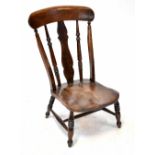 A 19th century elm seated low chair with vase splat back and turned spindles,