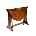 A 19th century walnut Sutherland table with shaped top on slender gateleg supports united by a