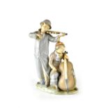 A Nao figure group of a cellist and a violinist, printed marks to base, height 34cm.