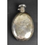 A hallmarked silver oval flask, length 11.