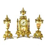 A gilt metal clock garniture,