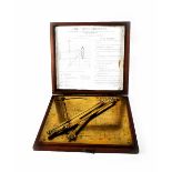 A mahogany boxed 'Derrickmeter',