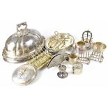 A large quantity of plated ware to include large ornate cover, toast racks, various serving dishes,