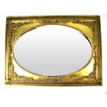 A modern gilt wood wall mirror in the antique style, the rectangle frame with a central oval mirror,