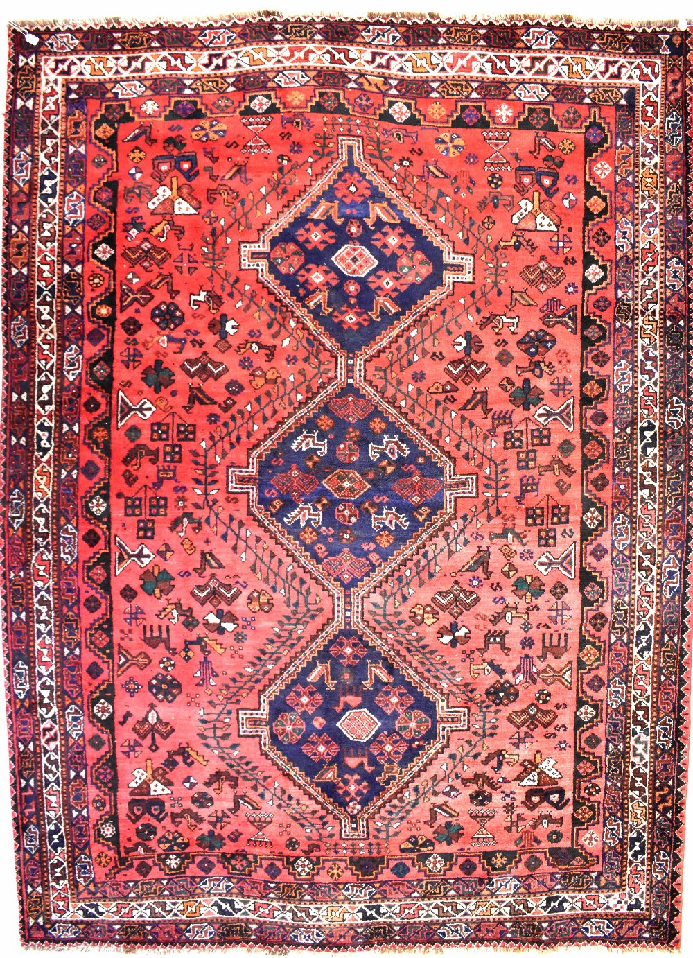 A Turkish Tabriz carpet of red ground,