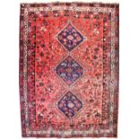 A Turkish Tabriz carpet of red ground,