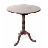A George III mahogany tilt-top occasional table with birdcage action,