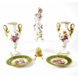 A pair of German porcelain vases with twin gilt handles and floral decoration, marked Alka Kunst,