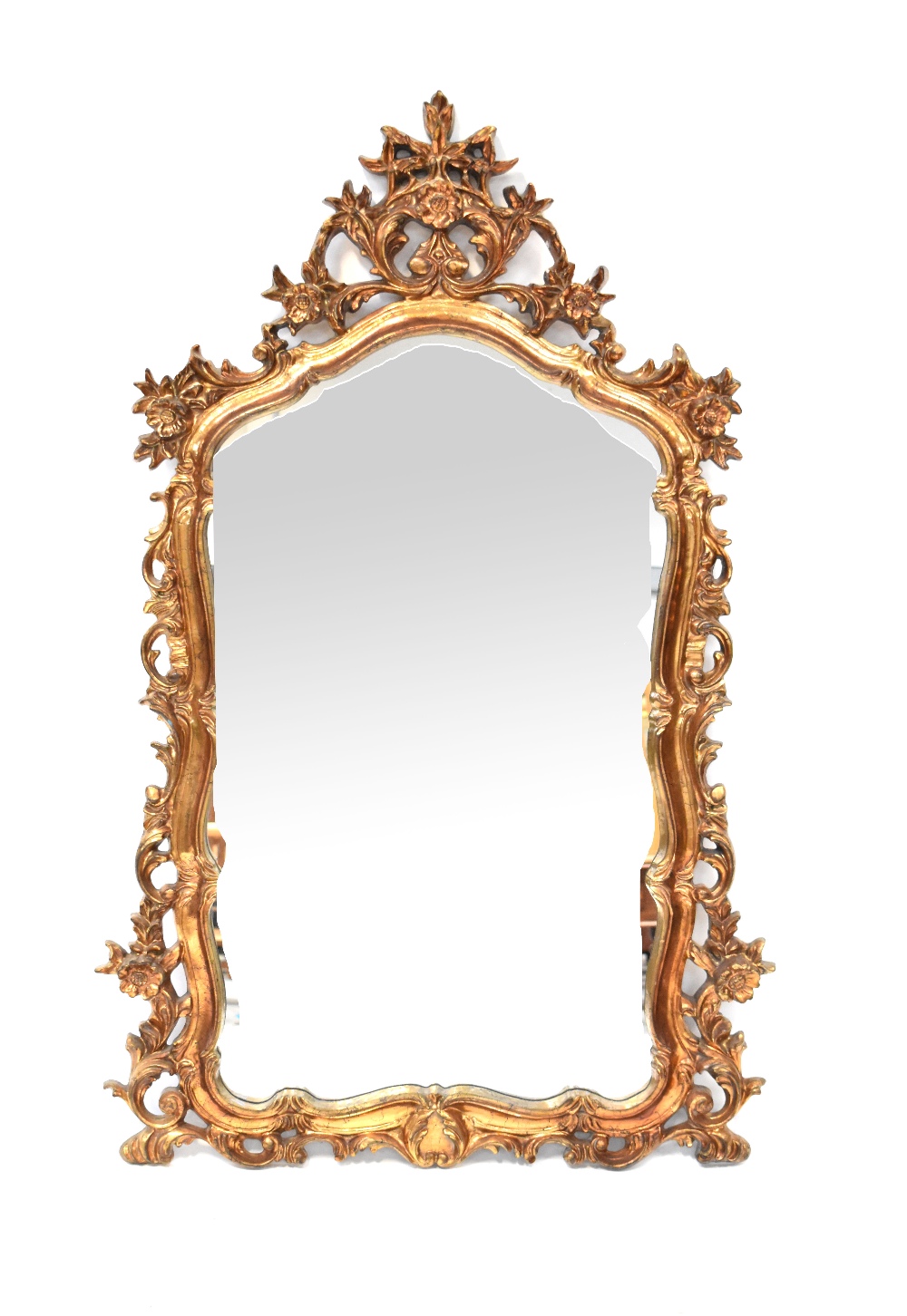 A Rococo-style gilt-framed mirror with shaped arched plate within pierced C-scroll and foliate
