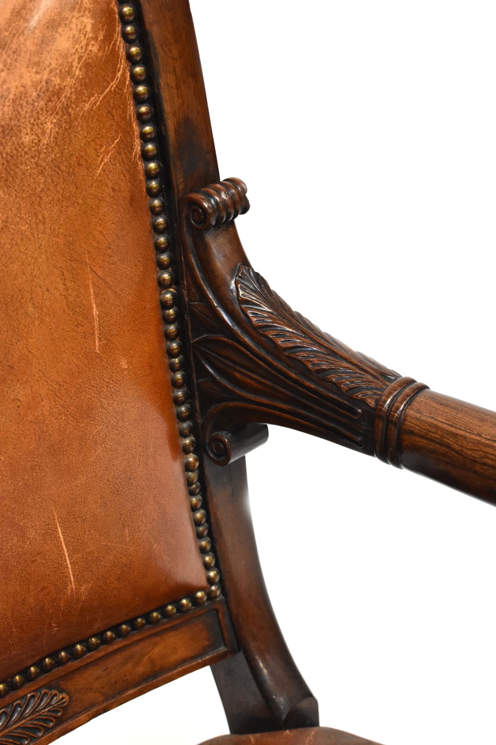 A 19th century rosewood open arm library chair with foliate and Athenian carved top rail, - Image 3 of 7