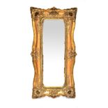 A Rococo-style gilt-framed mirror,