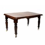 A Victorian mahogany extending dining table with one central panel, length when extended 136cm.