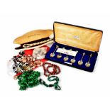 Various items of costume jewellery to include two green jade bead necklaces, a malachite necklace,