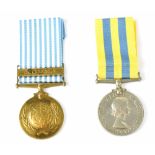 A Korea War Medal named to 223514 Pte. E. Heath. A.C.C. and the UN Korea Medal with clasp (2).