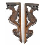 A pair of c1920s carved oak railway luggage brackets,