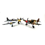 Two modern painted metal model aeroplanes, one painted in camouflage with French flag to tail, RFM,