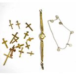 A quantity of gold plated and yellow metal crosses,
