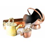 Various copper and brass ware comprising a helmet-form coal scuttle, bed pan, oil can,
