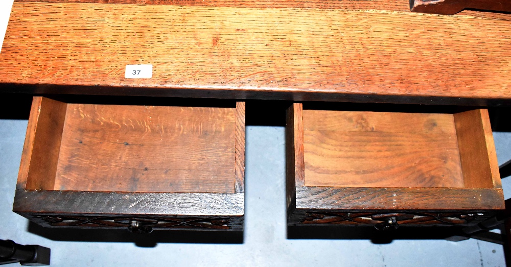 A large oak Gothic Revival refectory table with three drawers to each side with carved decoration - Image 2 of 3