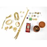 Various items of mostly gold plated costume jewellery to include fashion rings, jade-style brooch,