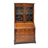 A George III inlaid mahogany bureau bookcase,