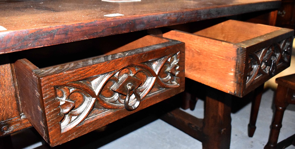 A large oak Gothic Revival refectory table with three drawers to each side with carved decoration - Image 3 of 3