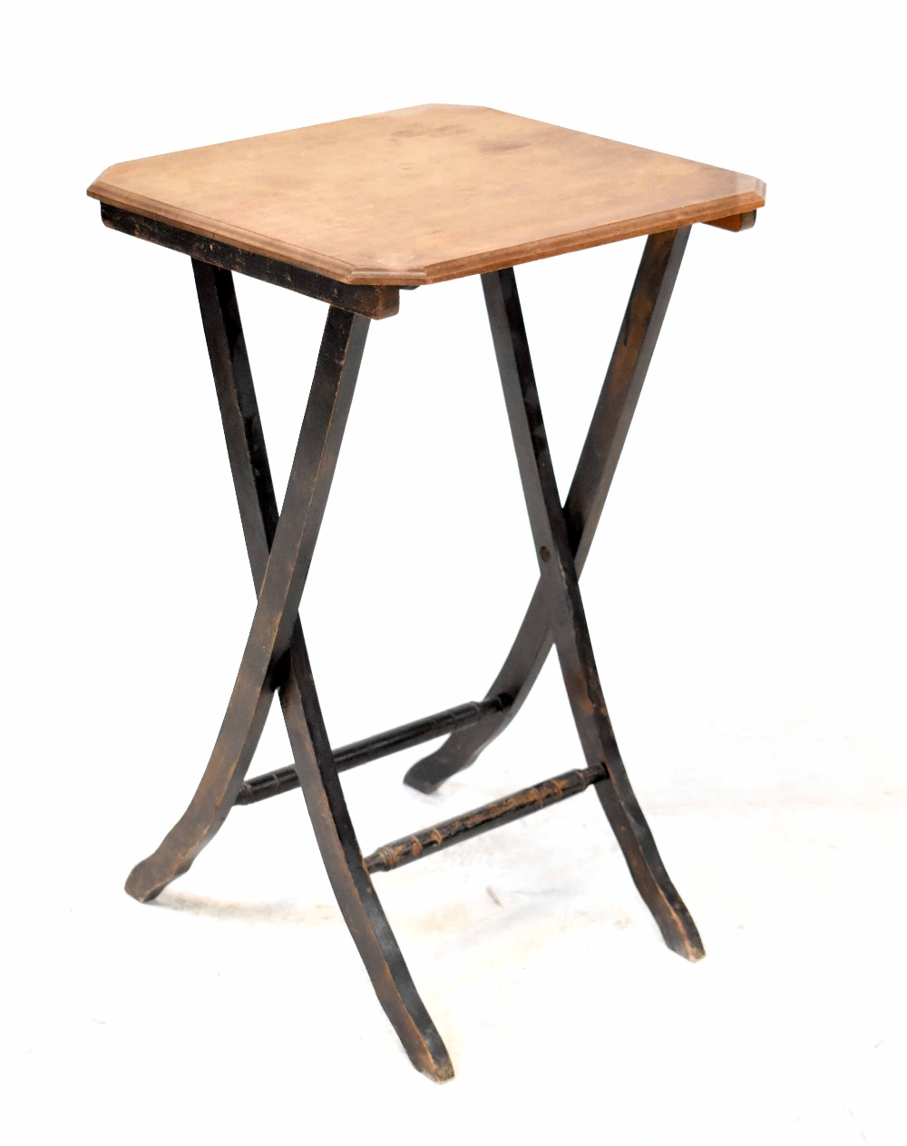 An early 20th century folding table with ebonised base, 60 x 38 x 38cm.