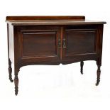 An Edwardian mahogany wash stand with gallery to top and pair of cupboard doors,