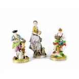 Two 19th century Dresden porcelain figures, one depicting a girl picking flowers,