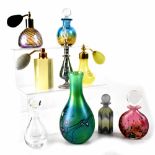 A collection of perfume related art glass to include three art glass atomisers comprising of John