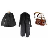 A WWII Civil Defence great coat, a military leather four-sectioned shoulder bag,