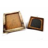 A George V hallmarked silver photograph frame of plain rectangular form with easel back,