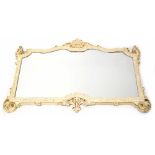 An 18th century style white painted and gilt highlighted mirror with rectangular shaped plate