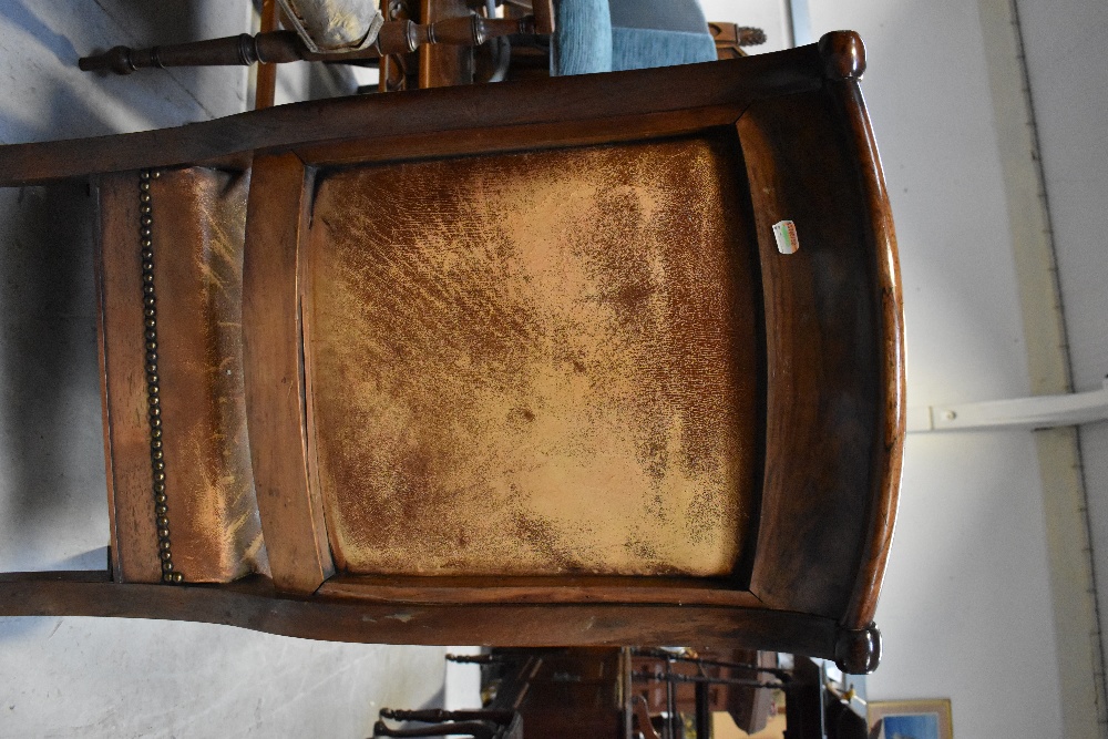 A 19th century rosewood open arm library chair with foliate and Athenian carved top rail, - Image 6 of 7