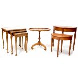 A reproduction mahogany oval occasional table to pedestal and tripartite support,