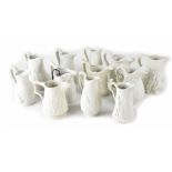 A group of various British Heritage Collection reproduction white Parian jugs,