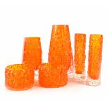 Six pieces of Whitefriars tangerine-coloured art glass to include a Coffin vase, height 13cm,