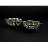 A pair of George V hallmarked silver lattice three-handled bonbon dishes, Birmingham 1910,