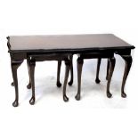 A reproduction cross-banded mahogany rectangular nest of three tables on cabriole legs,