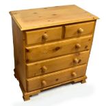 A modern pine chest of two short and three long drawers, width 62cm, depth 46cm, height 86.5cm.