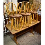 A rectangular refectory-type trestle table, 151 x 67, and a set of six Ercol-type elm seated comb