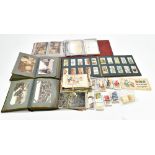 A collection of assorted postcards contained in albums and loose, various scenes and subjects to