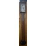 COMITTI; a reproduction inlaid oak cased stick barometer, with brass urn finial and silvered dial,