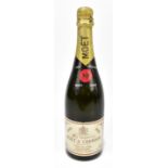 CHAMPAGNE; a single bottle of Moet & Chandon 1966.Additional InformationWear, lifting to the labels,