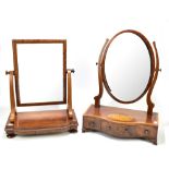 Two late Victorian/Edwardian mahogany toilet mirrors, the larger of serpentine outline with