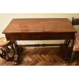 An early Victorian mahogany writing table, the rectangular top above three frieze drawers raised