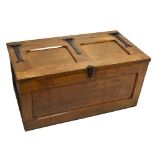 An Arts & Crafts oak blanket box, the hinged panelled lid with applied cast iron hinges, width